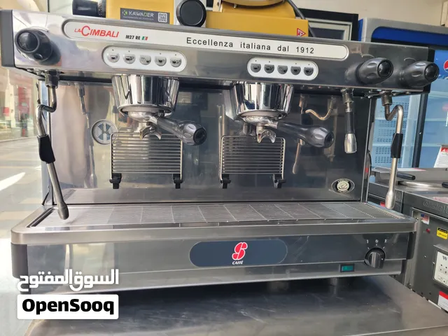 ماكينه قهوه اسبرسو ايطالي قروبين مستعمل نضيف  ماركه لا شمبالي m27