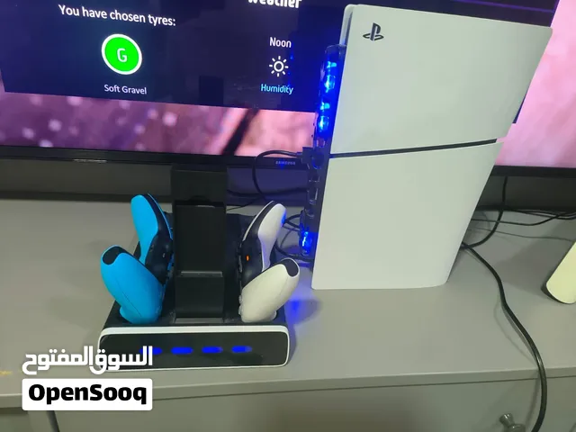 playstation 5 with controller and charging station