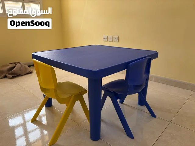 Children, table and chair