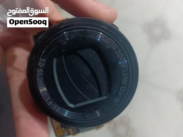 عدسه كامره بهذه شكل ب5 اقرى. وصف