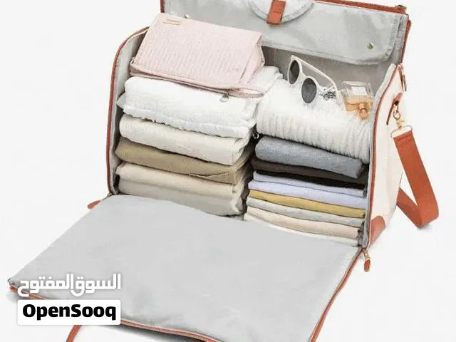 Premium Travel Bag حقيبة سفر فاخرة Travel in style with this elegant cream and brown trave