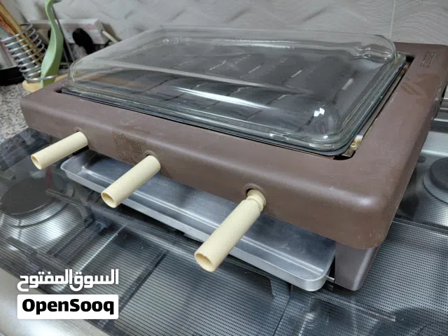 طاولة شوي كهربائيه