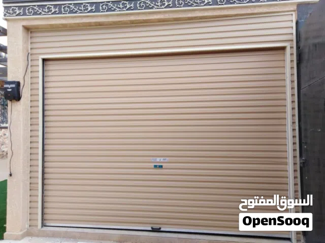 صيانة ابواب الكراج الأوتوماتيكية وشبابيك الشتر مكه