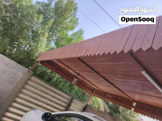 مضلة كراج هيكل حديد مغلف خشب