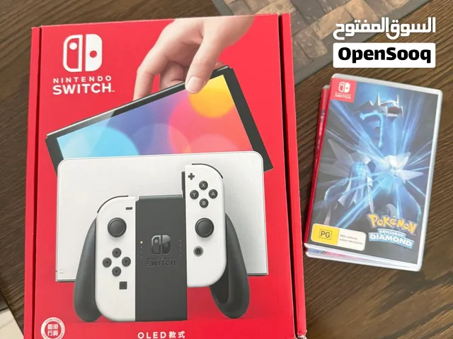 Nintendo switch oled white 576gb + 2 games