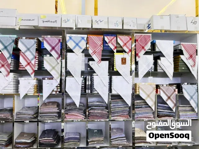 محل ملابس رجاليه وطنيه للبيع