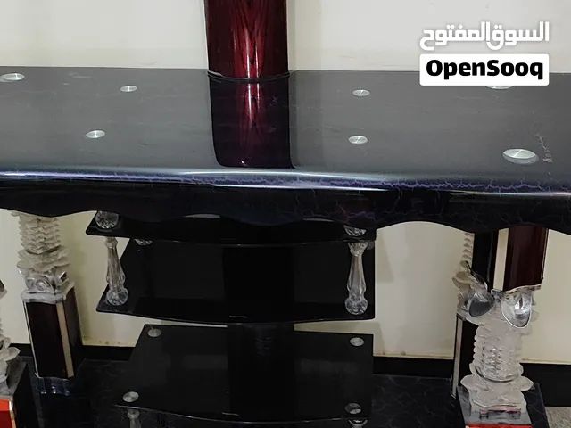 ميز جديد ما مستعمل معا ستان تلفزيون بعد بنايلون تجي وتشوف كلشي مابي لا مزلغ لا هاي السعر بـ75