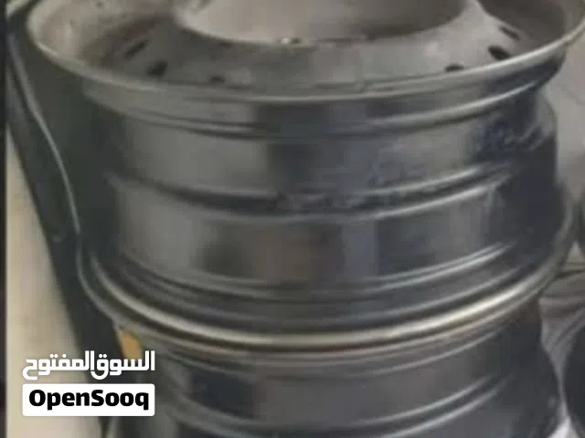 اربع جنوط حديد ياباني اصلي مقاس 15 للكرولا بحاله ممتازه مع 4 طاسات تويوتا