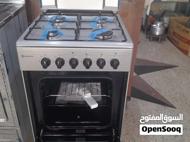 Cuisinière KitchenLux 4 feux inox   4 عيون غاز قوية وسريعة فالطهي  فور كبير مع باب زجاجي