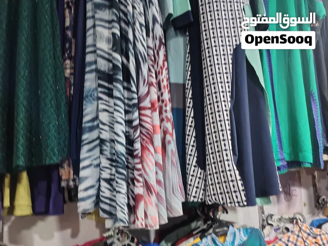 ملابس نسائيه باله دشداشه نسائيه وتراكات وبنطلون ولادي وبناتي وكابات وبديات وكم قطعه شي ان تواصل خاص