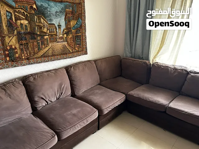 Brown L-shaped sectional sofa - used, good condition