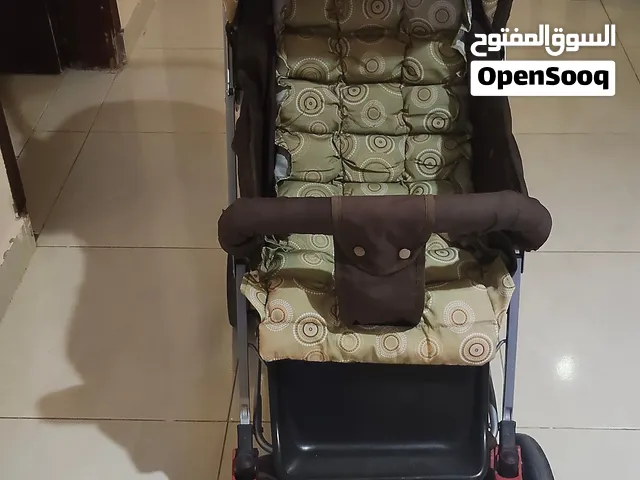 عرباية اطفال شبه جديدة