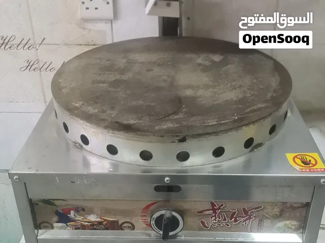 صانعة كريب على غاز