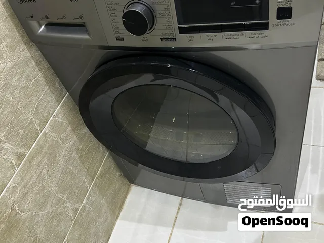 آلة تنشيف ملابس وبطانيات