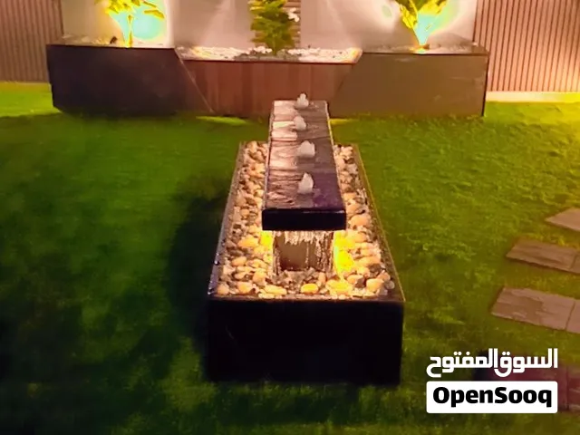 تنسيق حدائق الطائف عشب ارضي عمل شلالات عمل مظلات تركيب عشب صناعي تركيب عشب طبيعي
