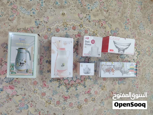 اواني زجاجية ودلتين للبيع بسعر رخيص