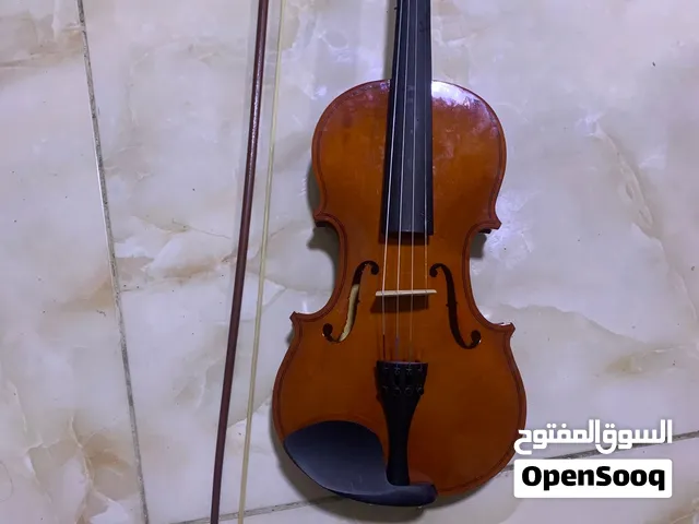 آلة موسيقية وترية (كمان)