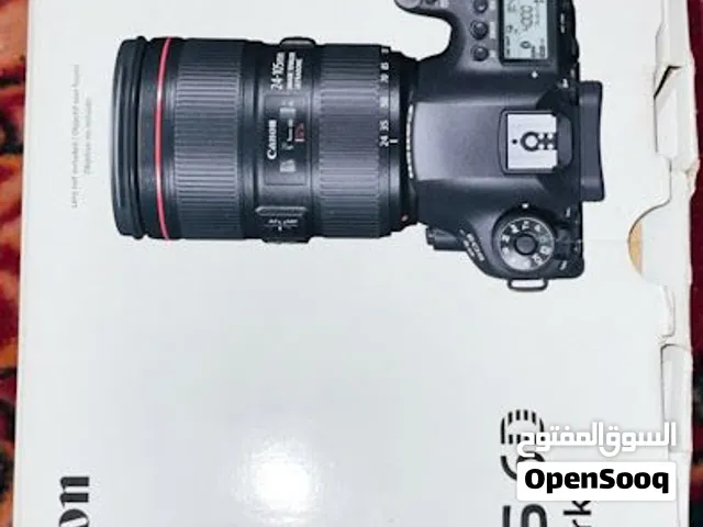كاميرا Canon EOS 6D Mark II مع عدسة زوم وملحقاتها الكاملة وبطاريتين