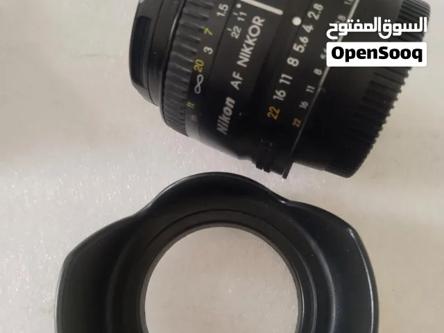 كمره نيكون3100 مع عدستين 18/55vrوعدسه50mm مع هدادكمره14 ميغ مكسل شاحن بطارية حقيبه سعر شترقليل وكالة