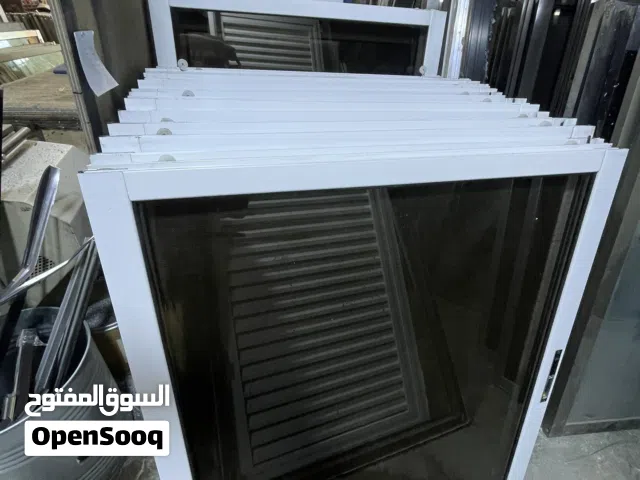 10 شبابيك الامنيوم لون ابيض زجاج برونز