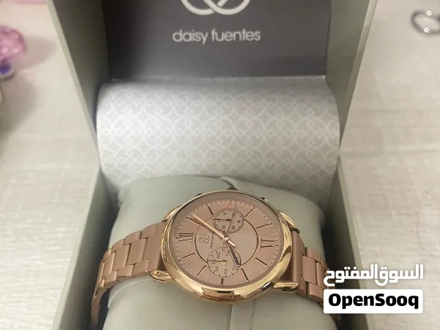 Daisy Fuentes gold rose watch like new, only a small defect in the box