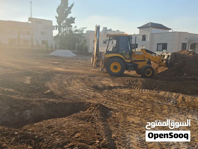 حفاره جي سي بي