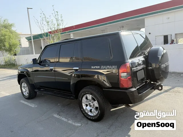للبيع 2009 فتك سوبر سفاري اسود ملكي/ تماتيك/ ماشي 455k قابل للزياده /فتحة دفلوك /سيتات مخمل كهرباء