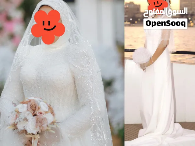 2 فستان زفاف للبيع بحالة ممتازة مع كامل الإكسسوارات مقاس صغير 55 كيلو و مقاس كبير 120 كيلو