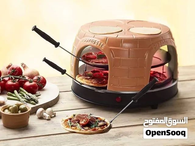 فرن البيتزا المنزلي Emerio Pizzarette Pre-Bake. وهو جهاز مخصص لإعداد وخبز الميني بيتزا مباشرة على طا