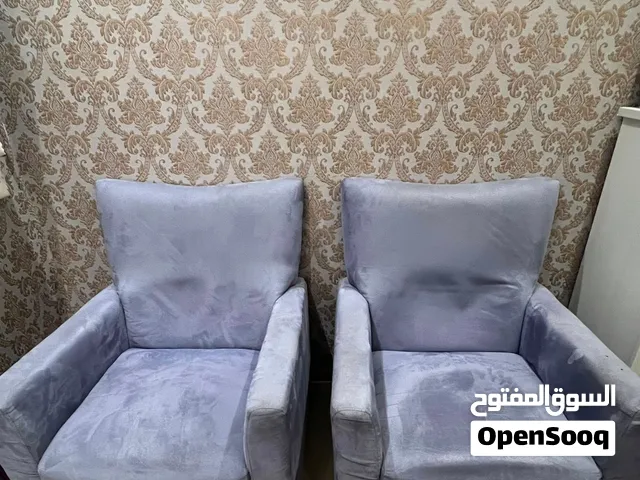 كنب لون موف من معرض اي دي ديزاين