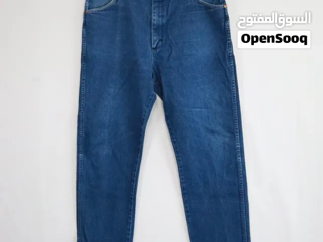 جينز نيلي گصة عدلة 110 قياس 32