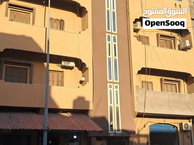 منزل ومحلات تجارية