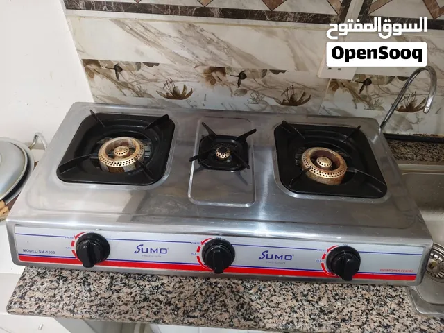 Gas stove with cylinder