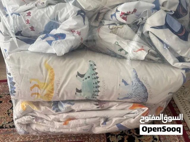 مجموعة اطقم شراشف ومخدات للاطفال وطقم لسرير حديث الولادة