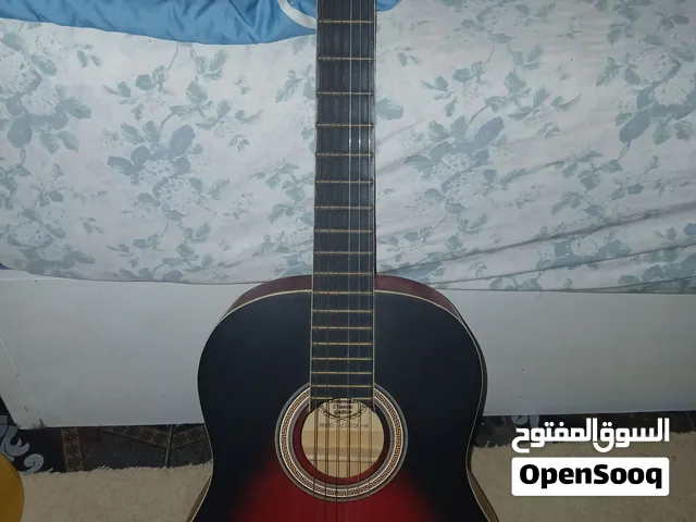 جيتار لون احمر