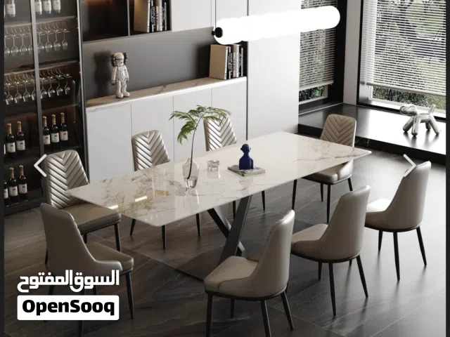 طاولة طعام 8 كراسي