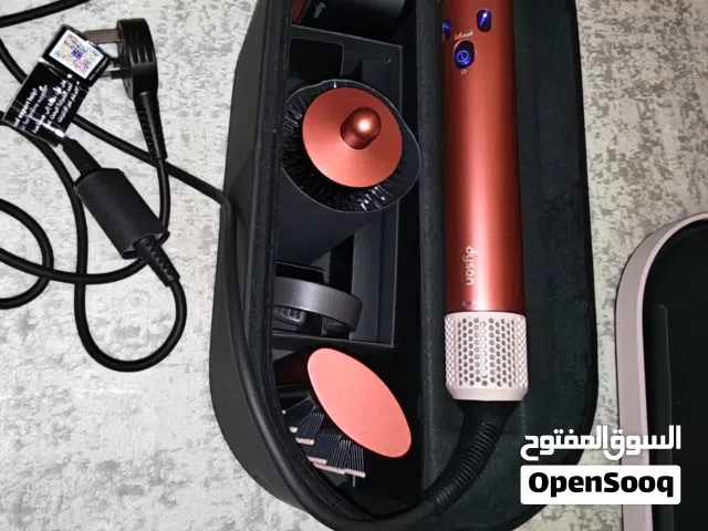 Dyson Airwrap i.d.TM multi-styler and dryer Straight+Wavy in Strawberry bronze and blush pink