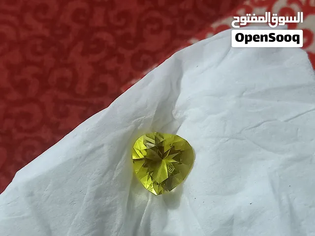 Natural Trilliant Cut Citrine Stone / حجر الستارين الطبيعي بقصة مثلثية