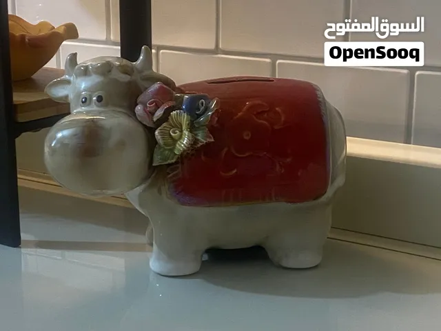 قاصة على شكل بقرة