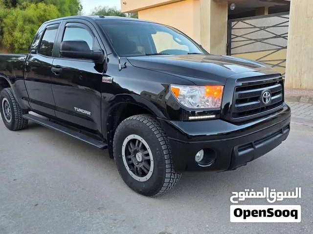 تيوتا تندرا2011 محرك57 رباعية TRD من هلها شاصي خالي من البخ والشرش ماشيه280 سيارة درجه اولى المكان ب