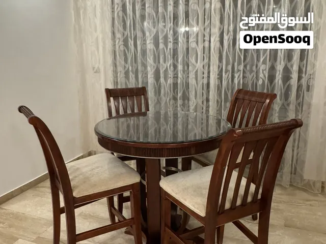 طاولة سفرة مع 4 كراسي high chairs