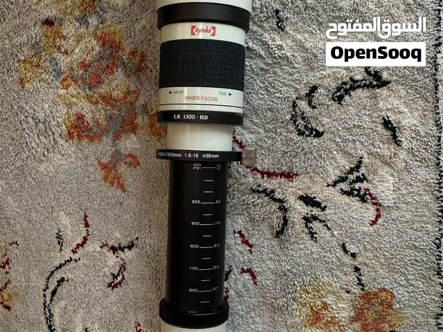 عدسة 650-1300 تقريب خارق من شركة Opteka