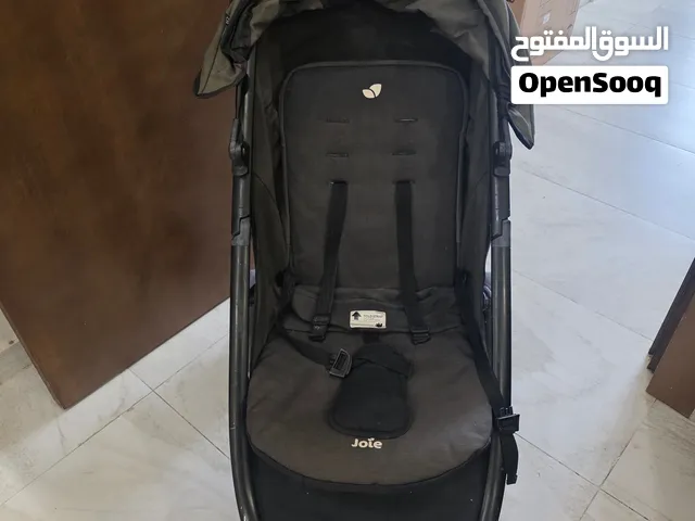 عربة اطفال أصلية ماركة جوي  بحالة ممتازة جدا