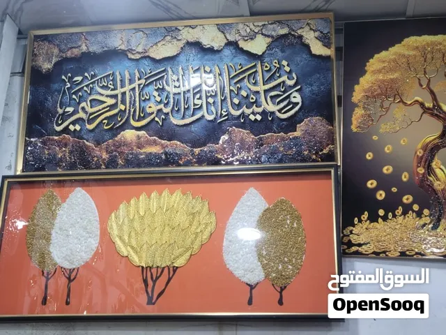 ساعات وصور ومرايه جدران استيل.