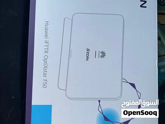 جهاز راوتر ومقوي إشارة فايبر (FTTR) من شركة Huawei يحمل شعار شركة الاتصالات Zain