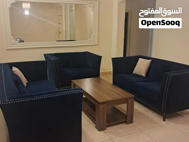 Sofa set with Table Colour: Dark Blue Size: 3 + 2 + 1 Seater with almost a new woden table.