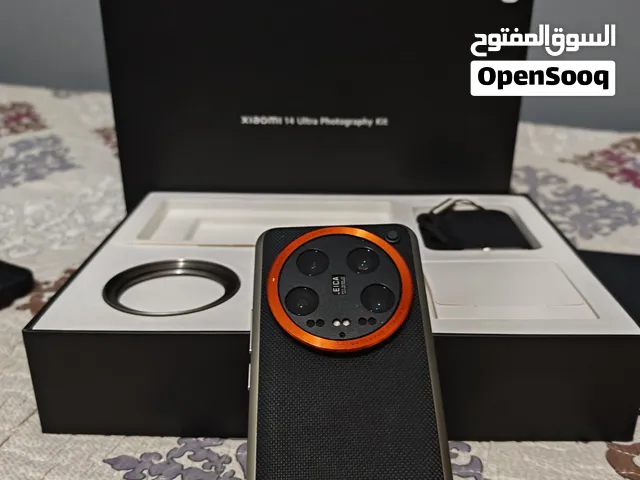 Xiaomi 14 ultra مع كت كاميرا وعدسة
