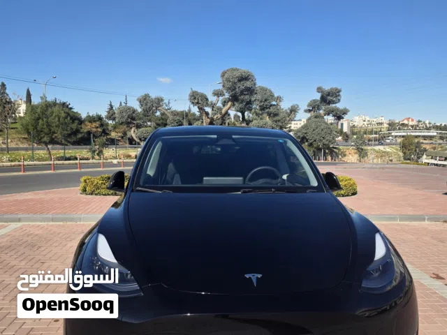 2024 Tesla Model Y Long Range Dual Motor سيارة مميزه لون اسود-مسجلة-بالوكالة-تأمين شامل-جرافين أصلي