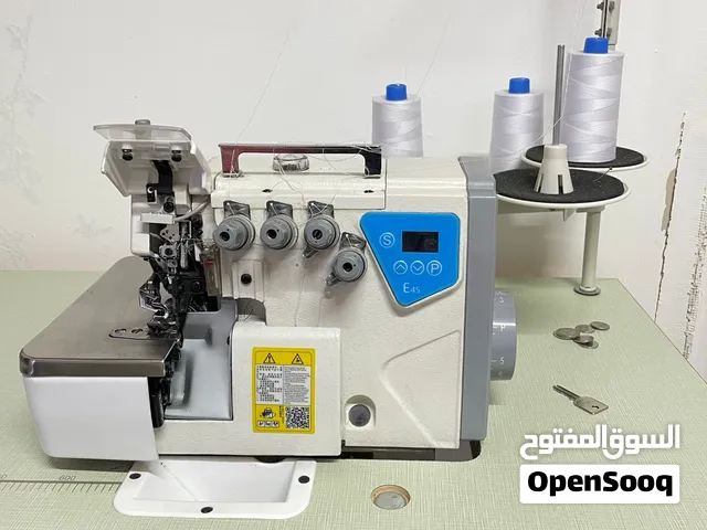 FOR SALE — 2 JUKI INDUSTRIAL SEWING MACHINES both overlock and straight