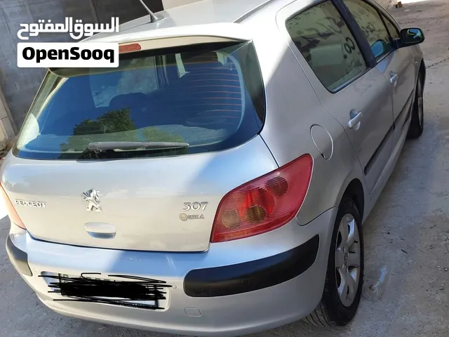 بيجو 307 لون فضي 2007 فل اضافات 24 الف